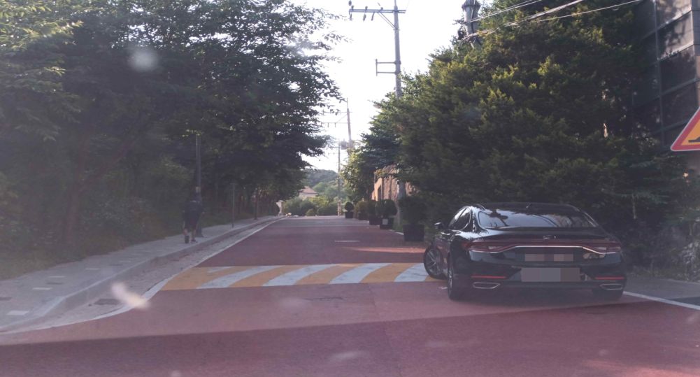 Residential back street · Vehicle on the right about to pull out