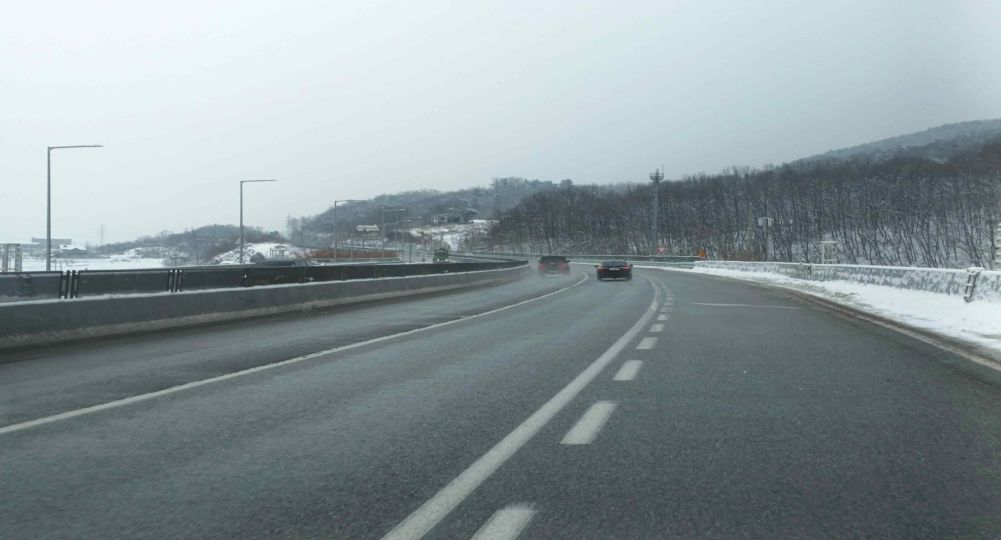 Merging from the entry lane on the right into the main lanes
