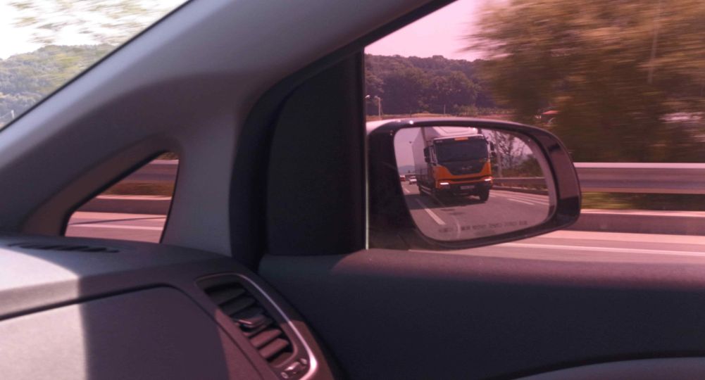 Expressway with three lanes in each direction · Truck traveling in lane 3 · Traveling in lane 2 and about to change to lane 3