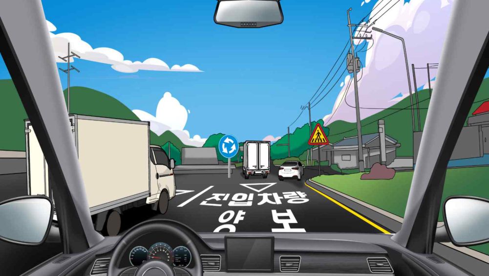 Vòng xuyến · Xe tải màu trắng đang định đi vào vòng xuyến