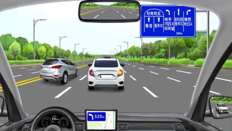 Driving at 50 km/h in lane 2 · Navigation indicates a left turn ahead · Following vehicle in lane 3 travelling at 60 km/h