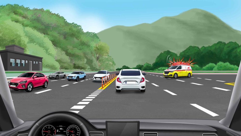 Emergency vehicle with siren and flashing lights on · The emergency vehicle is about to drive against the flow of traffic
