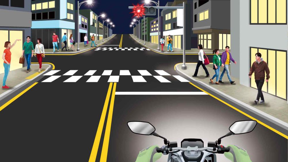 One-way 1-lane road with heavy pedestrian traffic · Intersection ahead with a flashing red light
