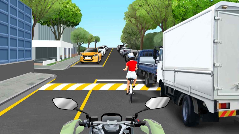 Going straight near a ㅓ-shaped intersection on a two-way 2-lane road with many parked vehicles on the right · A bicycle traveling ahead · Many vehicles coming on the opposite side of the road