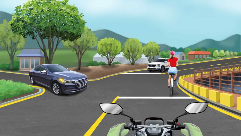An intersection without traffic signals · A yellow dashed center line across the intersection · A car turning right from the left · An oncoming car going straight